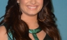 Demi Lovato impactante en vestido metálico en la final de Factor X [FOTOS]
