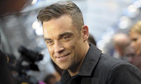 Robbie Williams no deja de llorar tras conocer que va a ser padre
