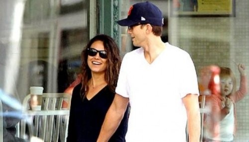 Mila Kunis y Ashton Kutcher tratan de evitar a los paparazzi en LA [FOTOS]