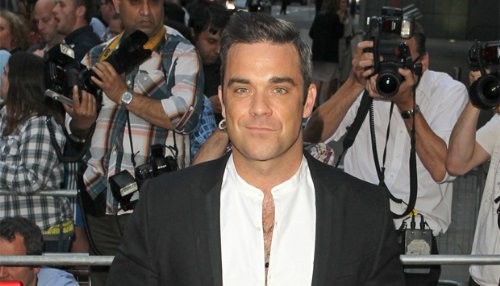 Robbie Williams: Soy fiel mientras no beba