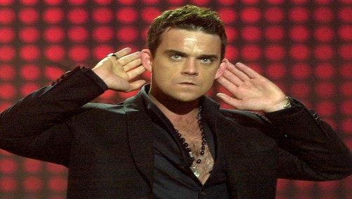 Robbie Williams se recupera de intoxicación alimenticia