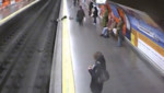 Mujer salva de morir antes de llegar el tren en Madrid [VIDEO]