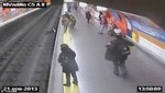 Rescate desesperado de un policía cuando mujer cae a las vías del tren [VIDEO]