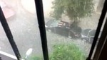 Hombre nada en el techo de su auto por el granizo [VIDEO]