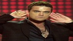 Robbie Williams se recupera de intoxicación alimenticia