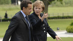 Sarkozy y Merkel: 'Si Italia cae será el fin del euro'