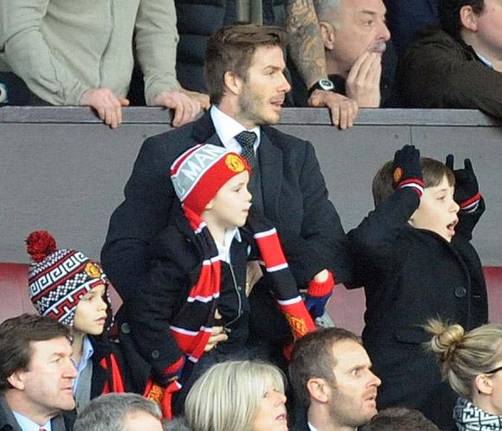 David Beckham lleva a sus hijos al estadio