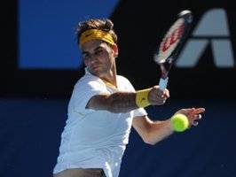 Federer y Wozniacki avanzan en el Abierto de Australia