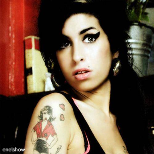 Amy Winehouse se hace amiga de un mono durante sus vacaciones Amy Winehouse se hace amiga de un mono durante sus vacaciones