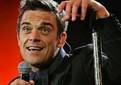 Robbie Williams tiene que madurar según su esposa Ayda Fields