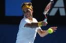 Federer y Wozniacki avanzan en el Abierto de Australia