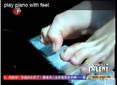 Un jóven pianista triunfa en Youtube y en la televisión Asiática sin brazos