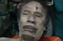 La foto de Kadafi abatido, murió finalmente en su ley
