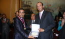 Congresista Juan Carlos Eguren Neuenschwander recibe plato recordatorio por la CONACO