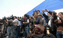 Periodistas peruanos en plena labor periodistica