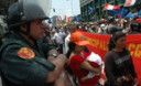 Grupo de manifestantes de la C.G.T.P durante una multitudinaria marcha que pretendía llegar al Congreso de la República